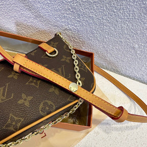 A ladies' clutch bag, designed to be worn over the shoulder or crossbody. Would you like it?