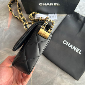 A small-sized women's bag in black and gold color, featuring classic diamond-shaped pattern, crafted from super soft lambskin leather, a must-have bag.