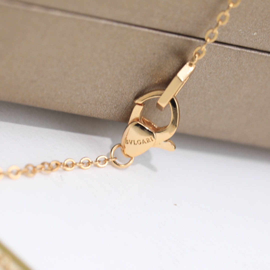 The classic snake-shaped necklace comes in two different color options, making it your own personalized accessory.