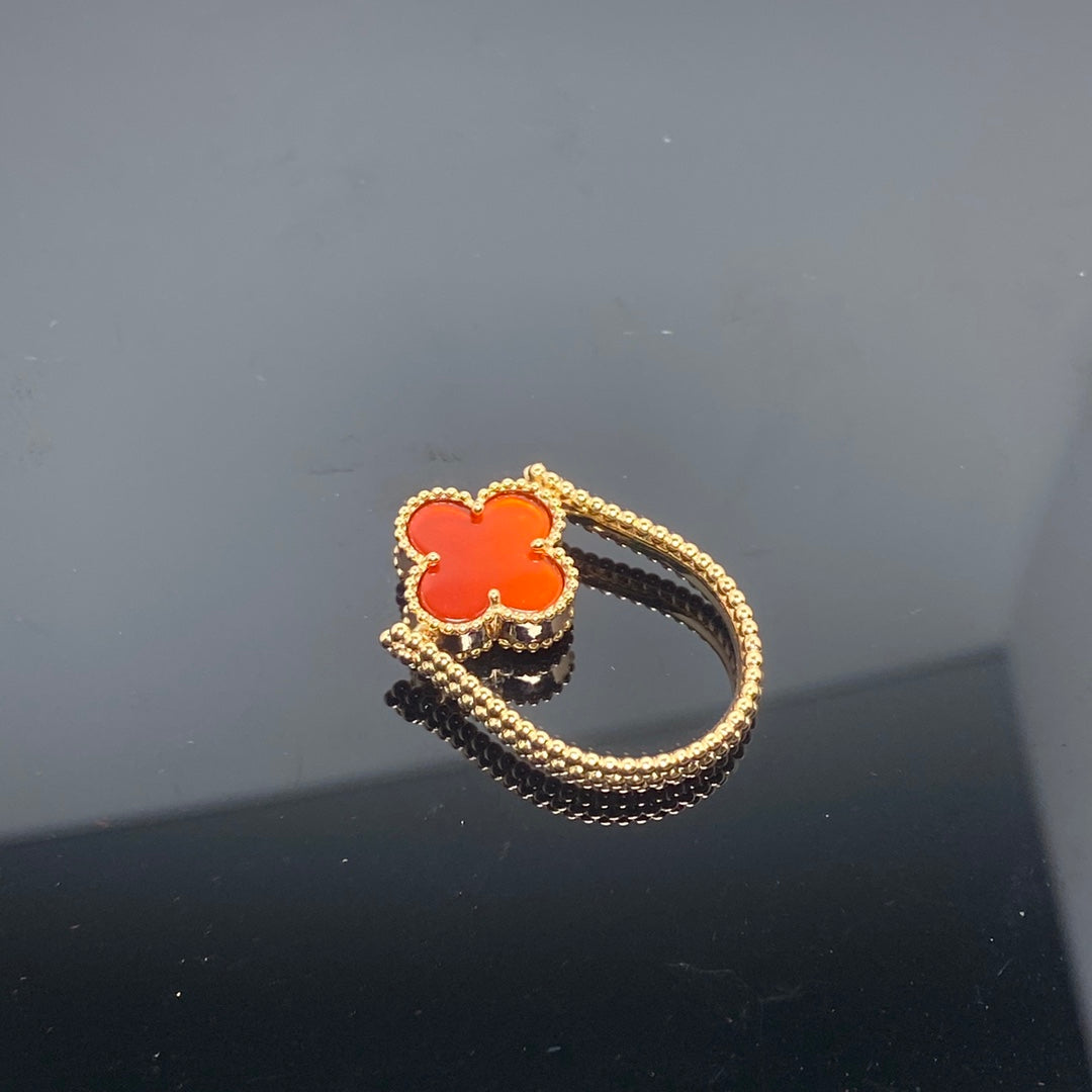 A spinning ring in the shape of a lucky clover, bringing fortune and good luck.
